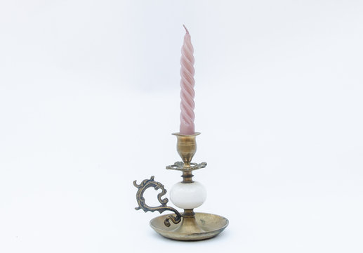 Vintage Copper Candlestick With Pink Candle - Isolated On White Background