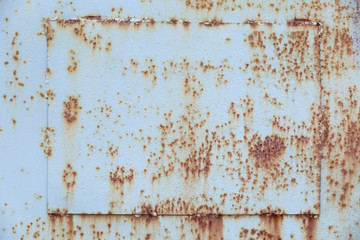 backdrop with welded sheets of rusty iron