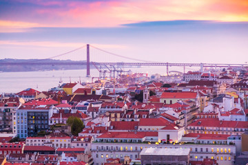 25 de Abril bridge during sunset seen from Sao Jorge Castle in city of Lisbon, Portugal