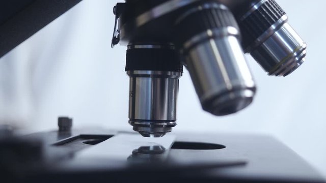 microscope close-up. automated research. search for germs and viruses.