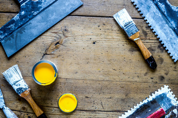 builder work with professional repairing implements set wooden background top view mock-up