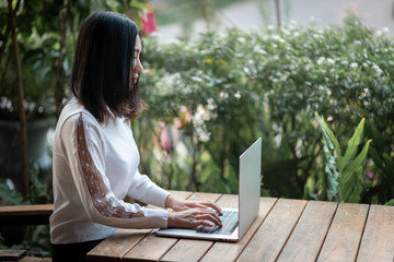 Working at home / Asians are sitting and working after the Coronavirus outbreak.