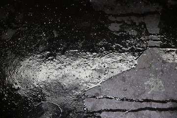 Obraz na płótnie Canvas fondo abstracto gris y negro con manchas y reflejos de luz 