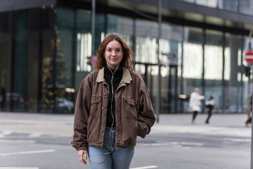 Young Caucasian Woman Walking on City Street