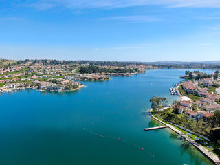 Naklejka na ściany i meble Aerial view of Lake Mission Viejo, with recreational facilities, surrounded by private residential and condominium communities. Orange County, California, USA