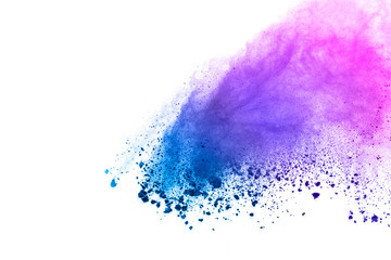 Freeze motion of colored powder explosions isolated on white background.