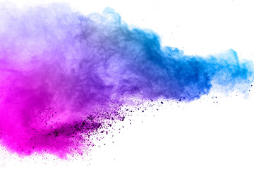 Freeze motion of colored powder explosions isolated on white background.