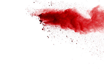 Red powder explosion on white background. Colored cloud. Colorful dust explode. Paint Holi.