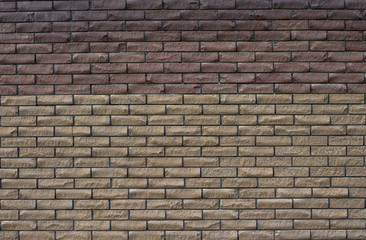 Texture, background wall of several brick walls and many rows of yellow bricks