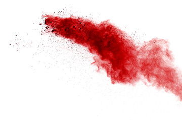 Red powder explosion on white background. Colored cloud. Colorful dust explode. Paint Holi.