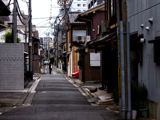 Japanese woman walking at a random street in Kyoto