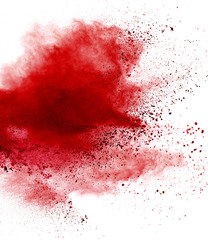 Red powder explosion on white background. Colored cloud. Colorful dust explode. Paint Holi.