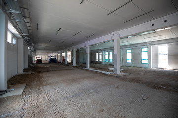 on  construction site the interior finishing of a factory building takes place