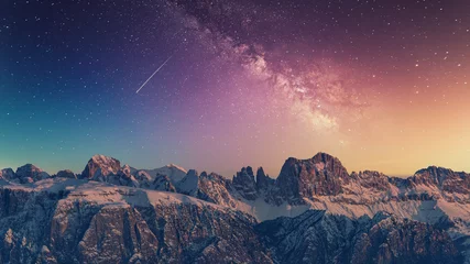 Tuinposter Snowy rocky mountain with a beautiful starry night, space fort text © Davide Marconcini