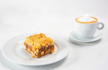 Apple pie dessert accompanied by a cup of coffee
