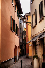Narrow street of Downtown Lecco, Lombardy, Italy.