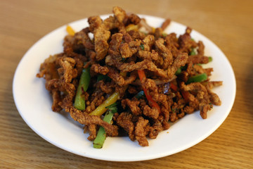Fried beef and veggies served on a plate in Din Tai Fung restaurant of Mall of the Emirates in Dubai UAE, December 2019. Healthy, delicious and fresh asian food offering good value for money.