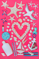 Summer holiday beach collection with seashells, heart shaped cockle shell wreath, beach toys, rock candy and suntan protection lotion. Summer holiday themed concept on vivid pink background. 