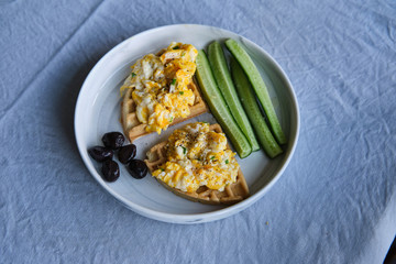 Homemade Paleo, Gluten Free and Sugar Free Healthy Waffles served with Scrambled Eggs