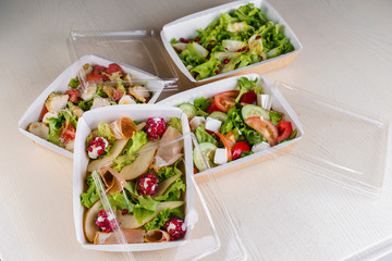 4 Green natural salads in eco thermo box with microgreen, veal, cucumber, tomato, cheese, garnet, peal. Safety delivery at quarantine covid 19. On line order. 2+2 salads advertise for social networks