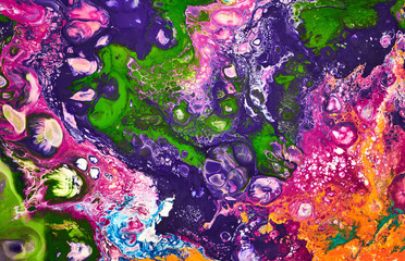 Naklejka premium Fluid Art. Abstract colorful background, wallpaper. Mixing paints. Modern art. Marble texture. Spellbinding abstract cosmic landscape..