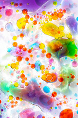 Planet Looking Bubbles of Coloured Water on Oil Fantasy Background