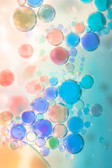 Planet Looking Bubbles of Coloured Water on Oil Fantasy Background