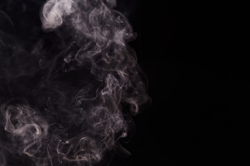 Smoke fragments on a black background