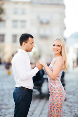 Loving couple walking in the city. Lviv