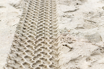 Tire tracks in the sand