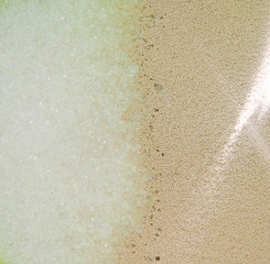 Sugar and yeast in a bowl in macro. Making pizza,  dough