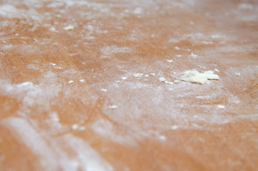 Flour on the table. Small lumps of dough on the table. Cocaine like  flour