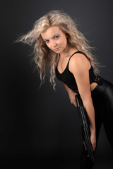 sexy blonde with gun