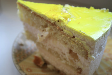 A piece of lemon pie on a plate