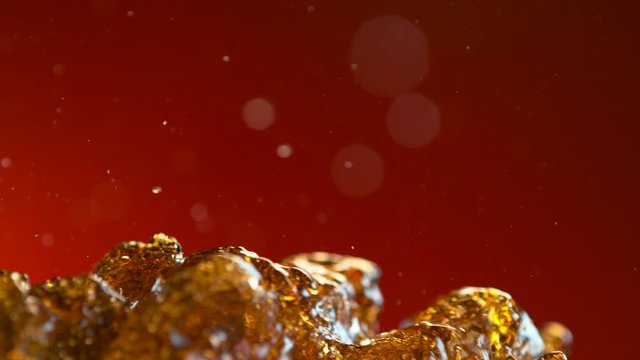Coca cola splash on red christmas background