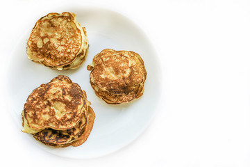 Pancakes on a white plate