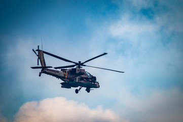 Naklejka na ściany i meble Israeli Air Force, Apache helicopter fly above the ocean 