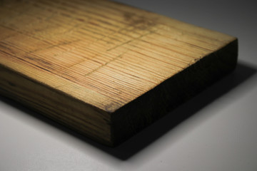 Wooden board on a gray background