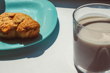 Croissant on a blue plate
