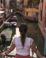 Woman viewing Venice's canals