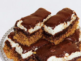 Home made cake topped with dark chocolate