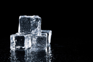 ice cubes on black background