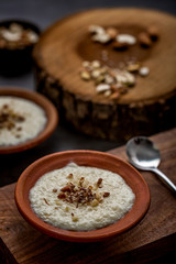 Phirni, a traditional and delicious indian style milk and rice based creamy dessert, served in clay pot