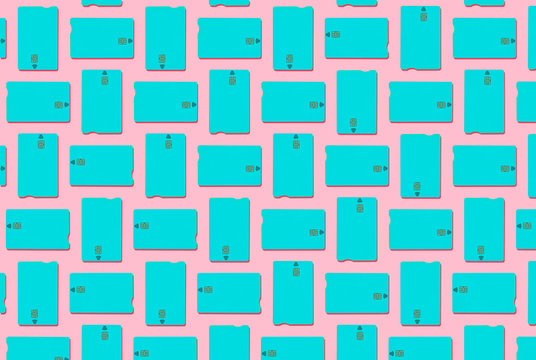 Blue contactless credit cards pattern on pastel pink background