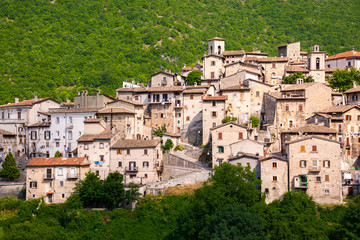 Fototapeta na wymiar Picturesque small town or village in Italy. Panoramic view of old houses
