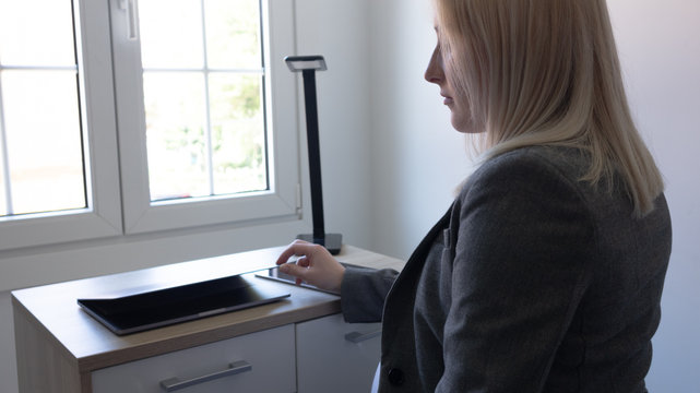 blonde girl working in an office