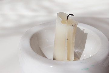 Flat layout magical with candles on white marble with a light shadow. Halloween mysticism and witchcraft concept