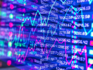 Digital composite of two stock market data displays