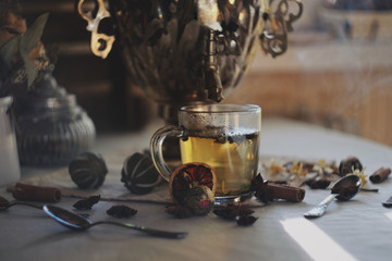 Tula samovar with tea, bagels and flowers