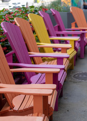 Fototapeta na wymiar Colourful Muskoka chairs